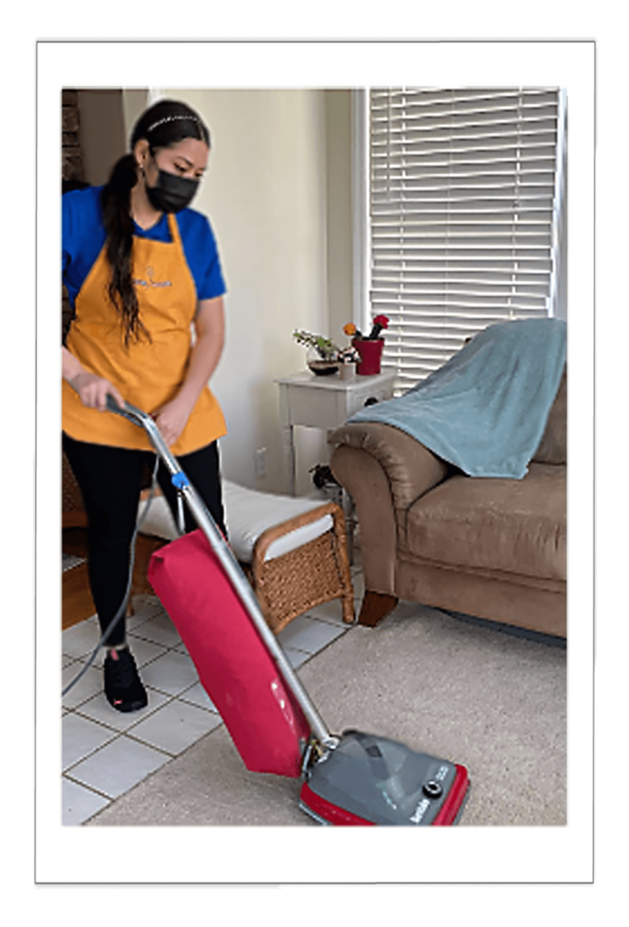 carpediem cleaning-woman with vacuum and cleaner bag