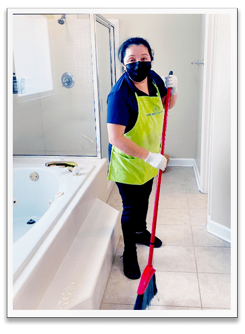 photo of a carpediem cleaning lady, cleaning the bathroom