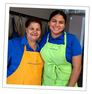 an image of two women employees of carpe diem smiling
